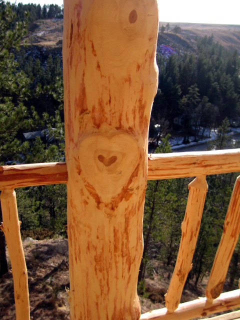 Picture of Hand-Peeled Posts inlaid into railing